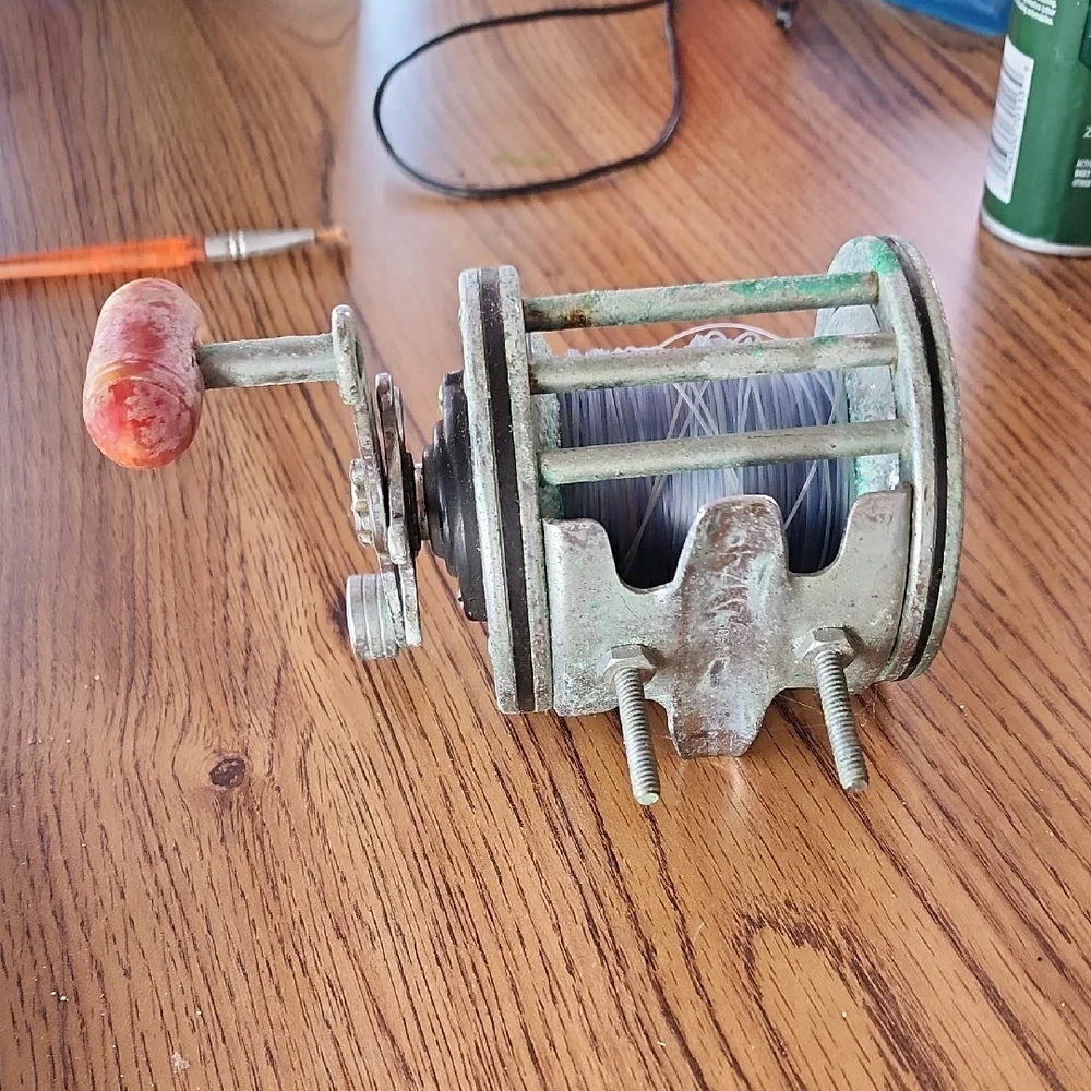 Vintage Fishing Reel with Line